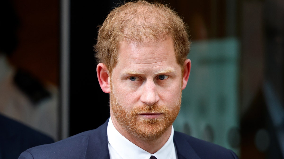 A close-up of Prince Harry looking stern