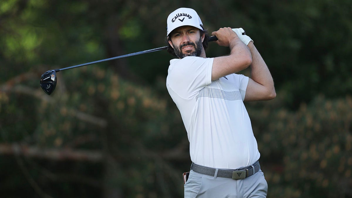 Adam Hadwin swinging club