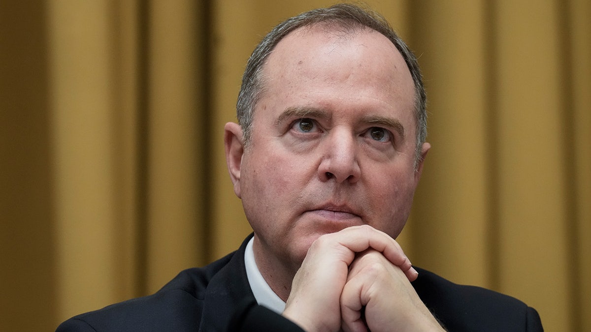 Adam Schiff with hands folded