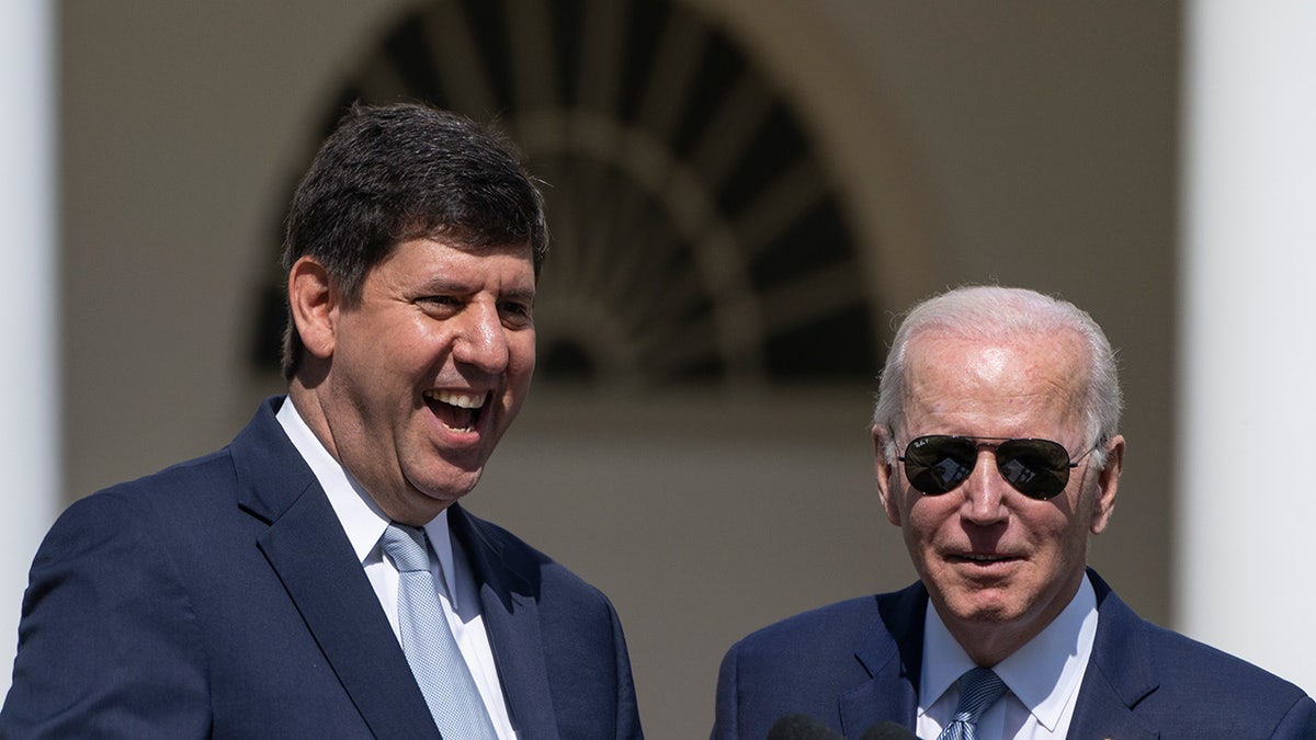 ATF nominee Steve Dettelbach stands next to President Joe Biden