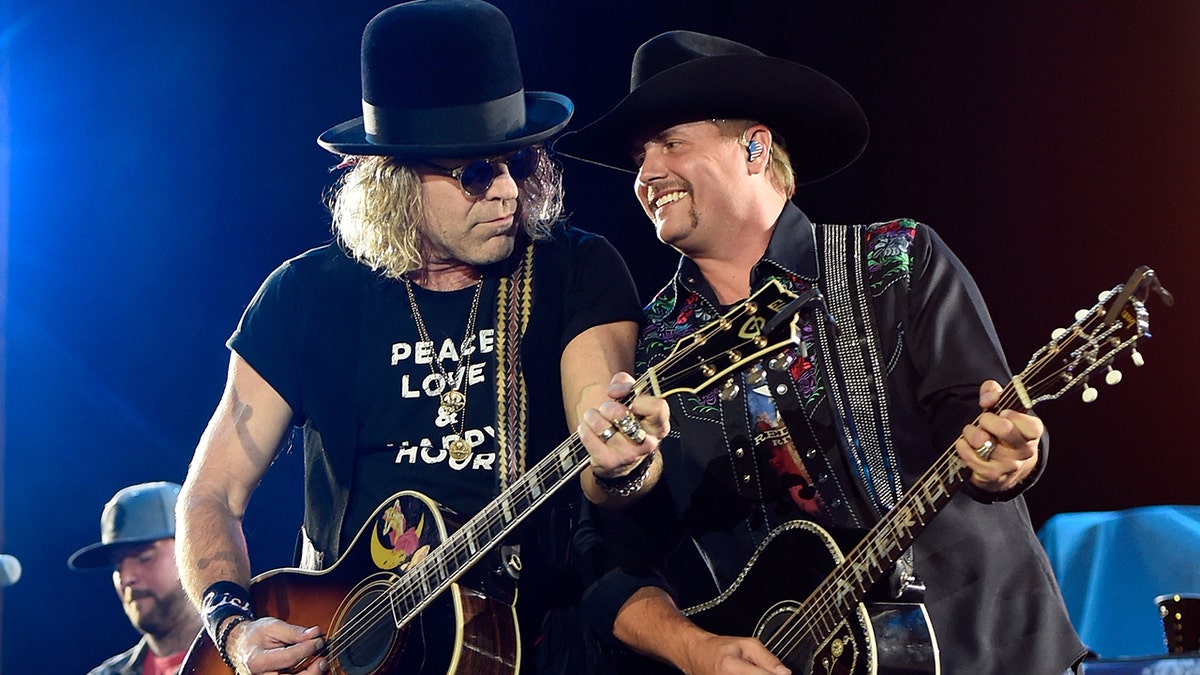Country stars Big & Rich perform on stage at a concert