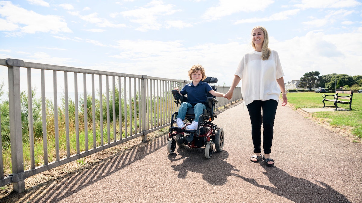 boy with disabilities in a wheelchair