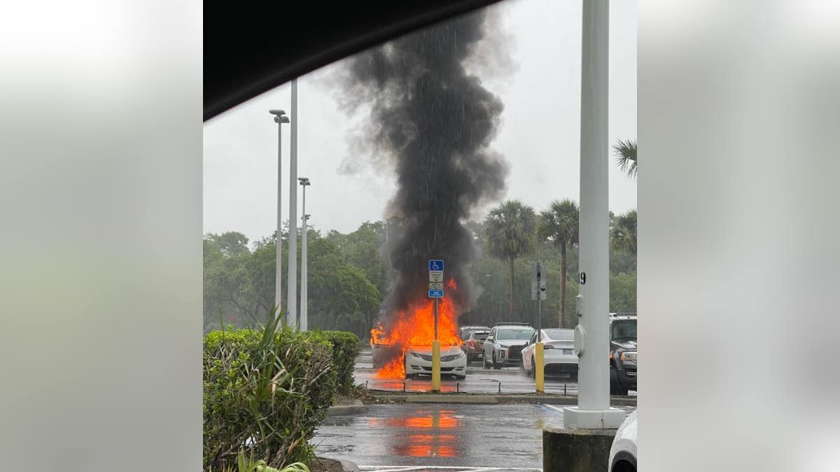 Shoplifting car in flames