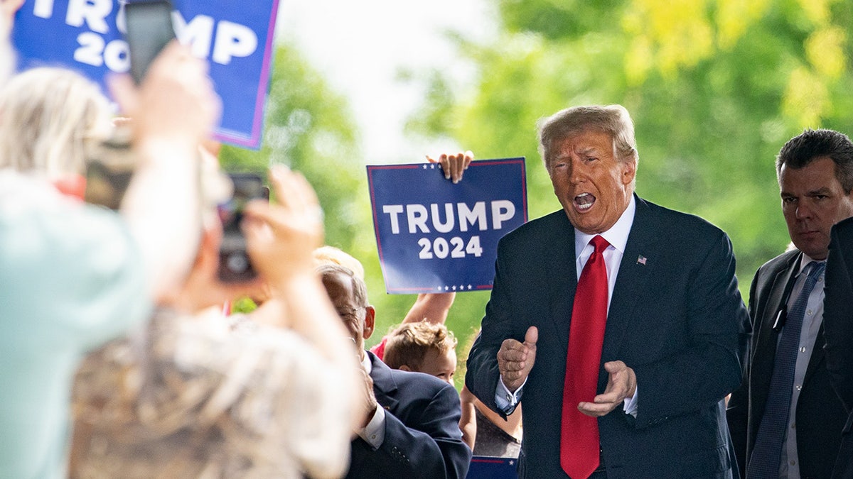 Former President Donald Trump campaigns in Iowa