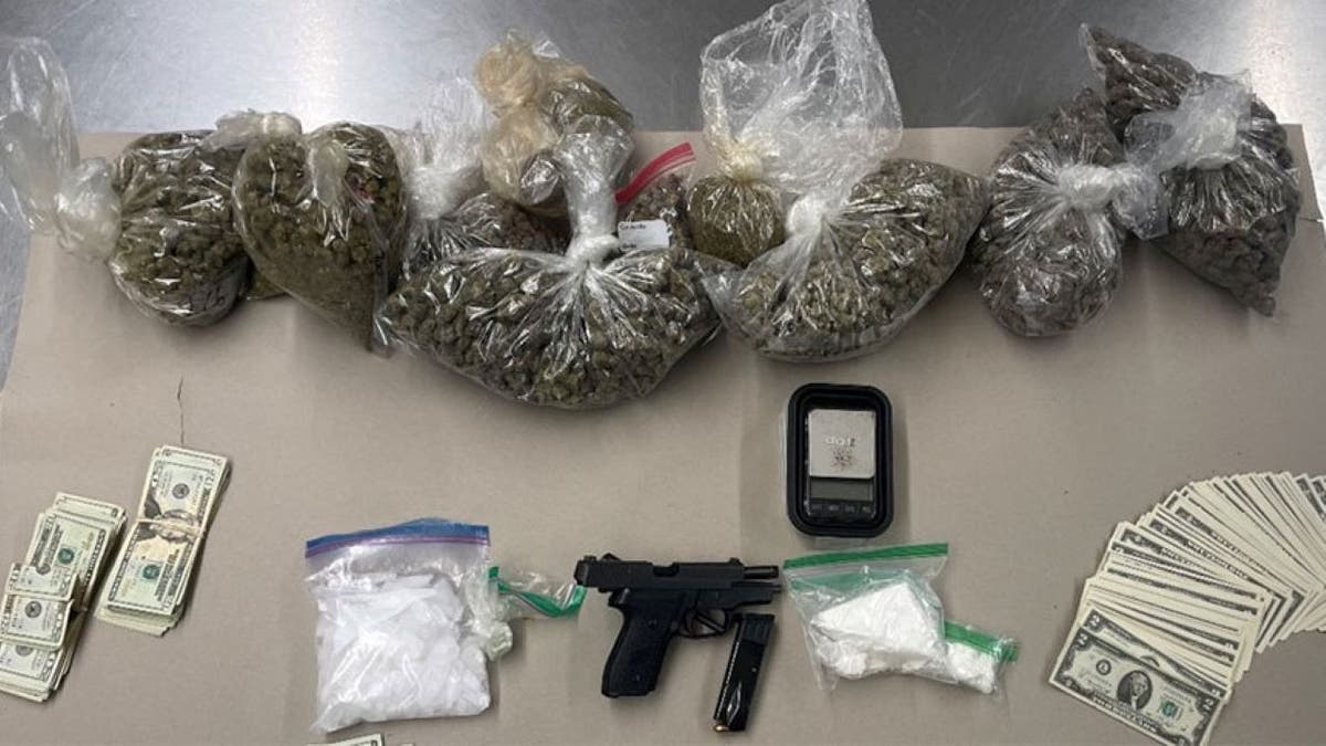 Picture of seized drugs and firearm