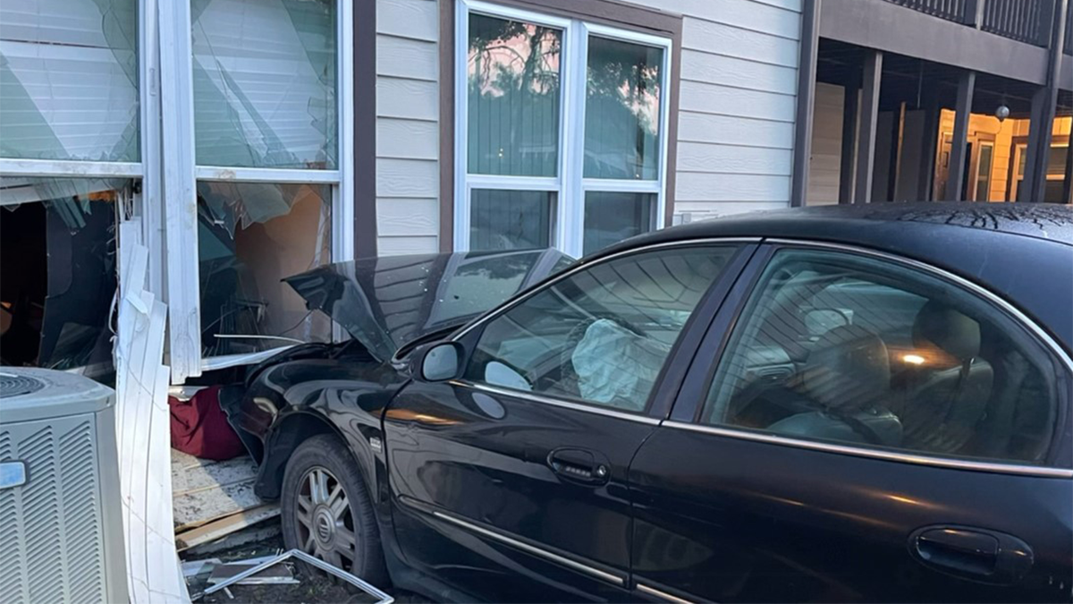 Car crashed into building