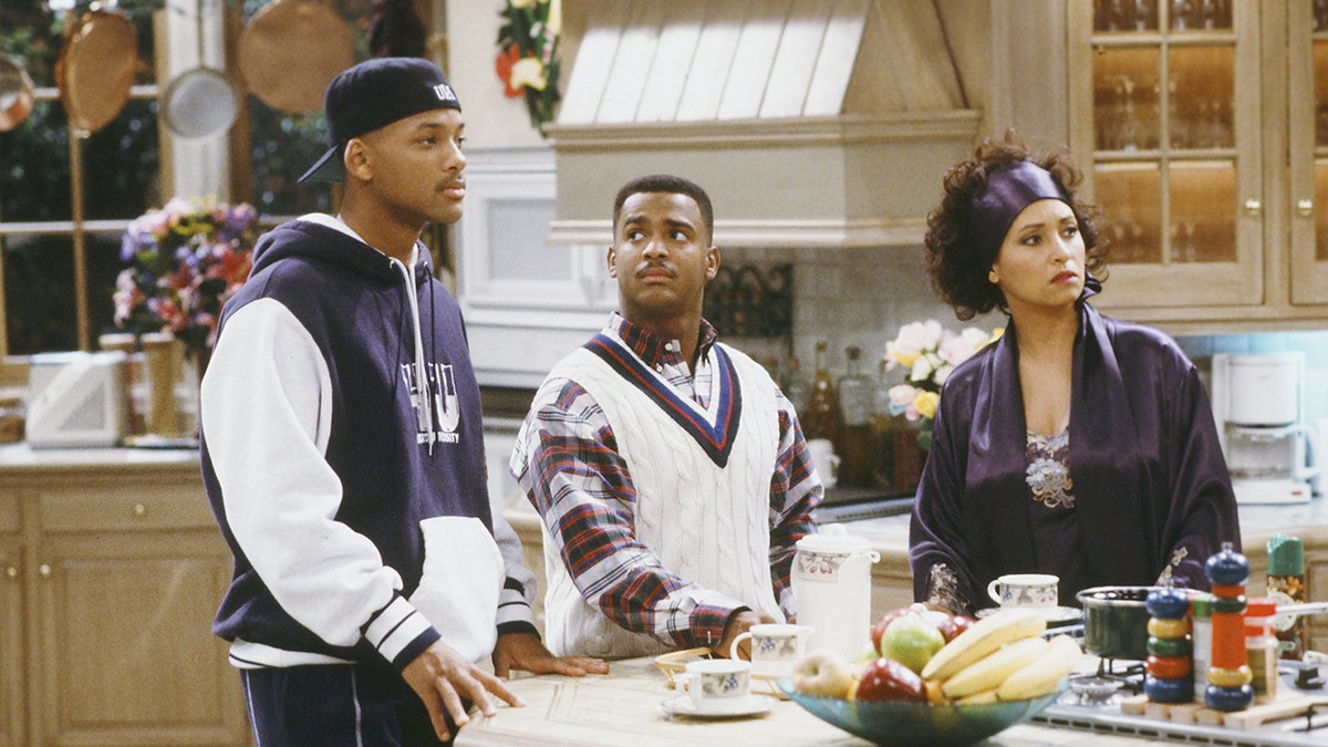 Will Smith and Alfonso Ribeiro stand in the kitchen in Fresh Prince of Bel Air scene