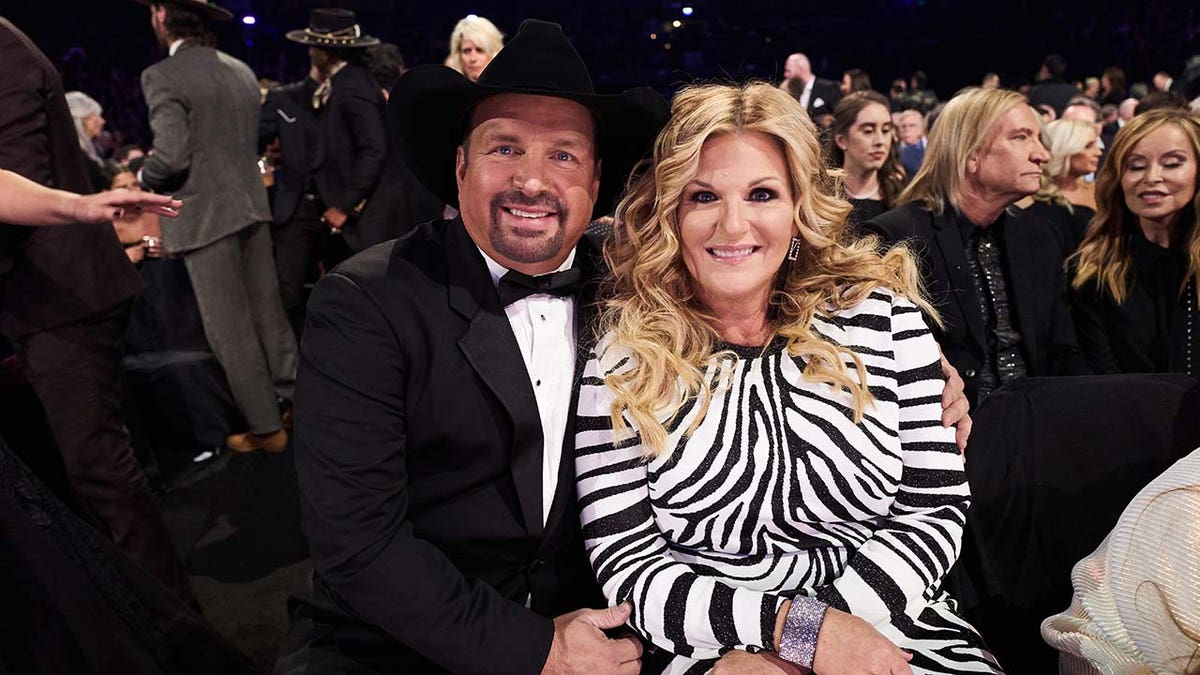 Trisha Yearwood and Garth Brooks at an event