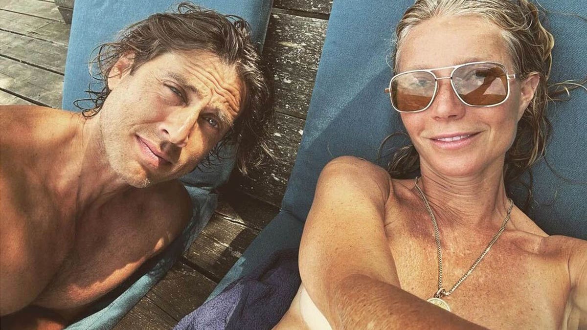 gwyneth sunbathing topless with husband brad falchuk in italy
