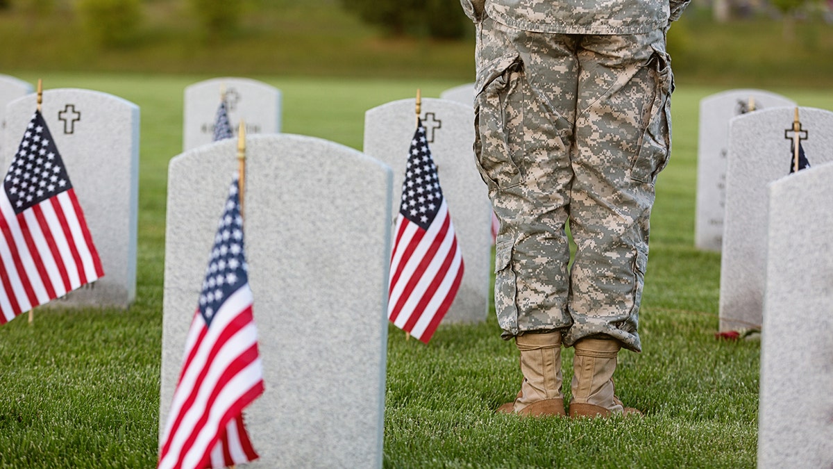 us soldier at cemetery