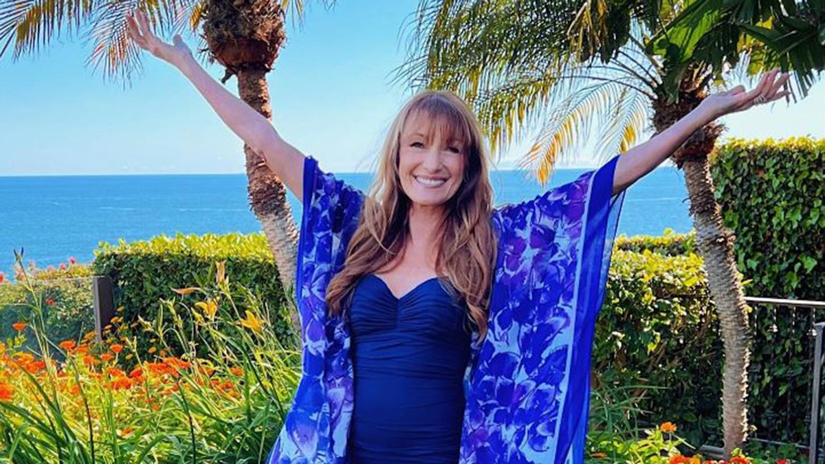 Jane Seymour in a blue bathing suit