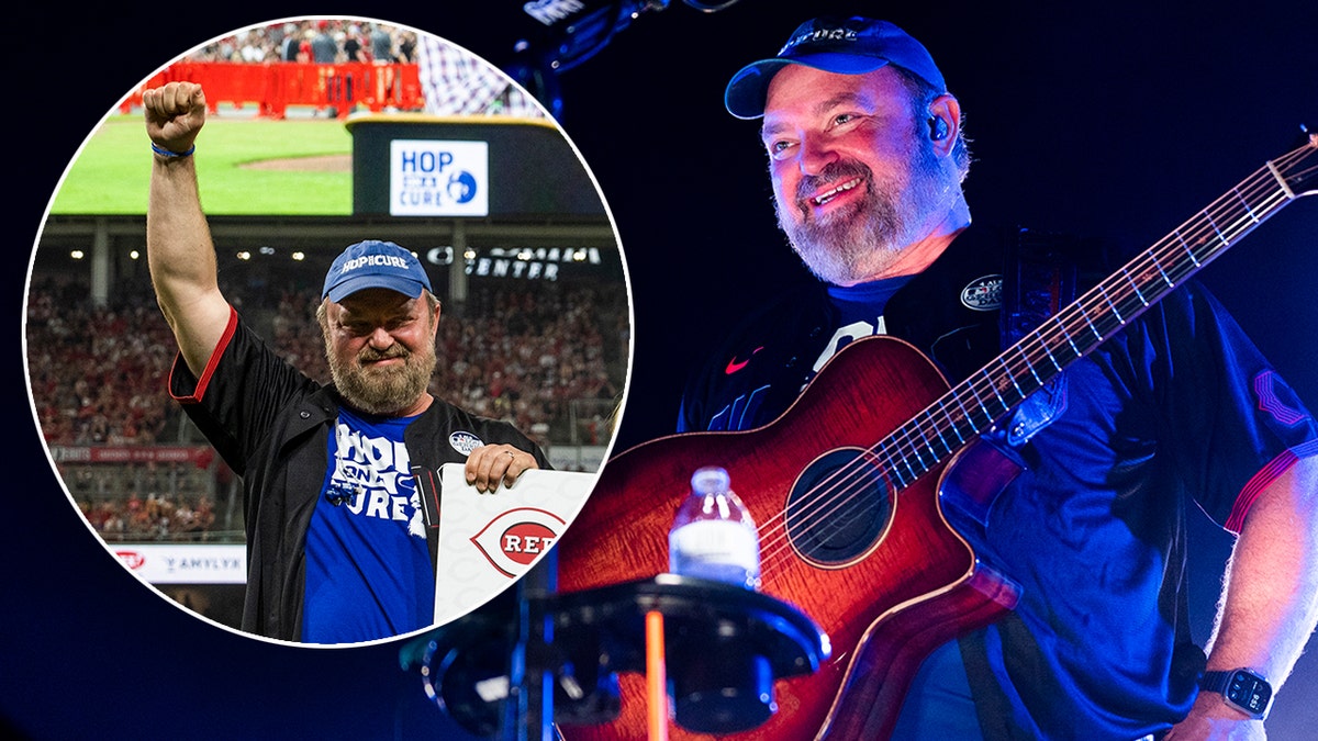 Zac Brown Band musician John Driskell Hopkins plays the guitar on stage
