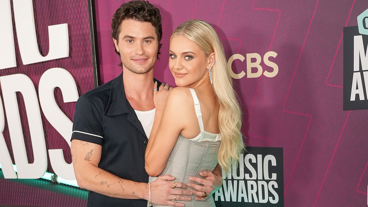 Kelsea Ballerini shows off white bra in Dolce dress at CMT Awards