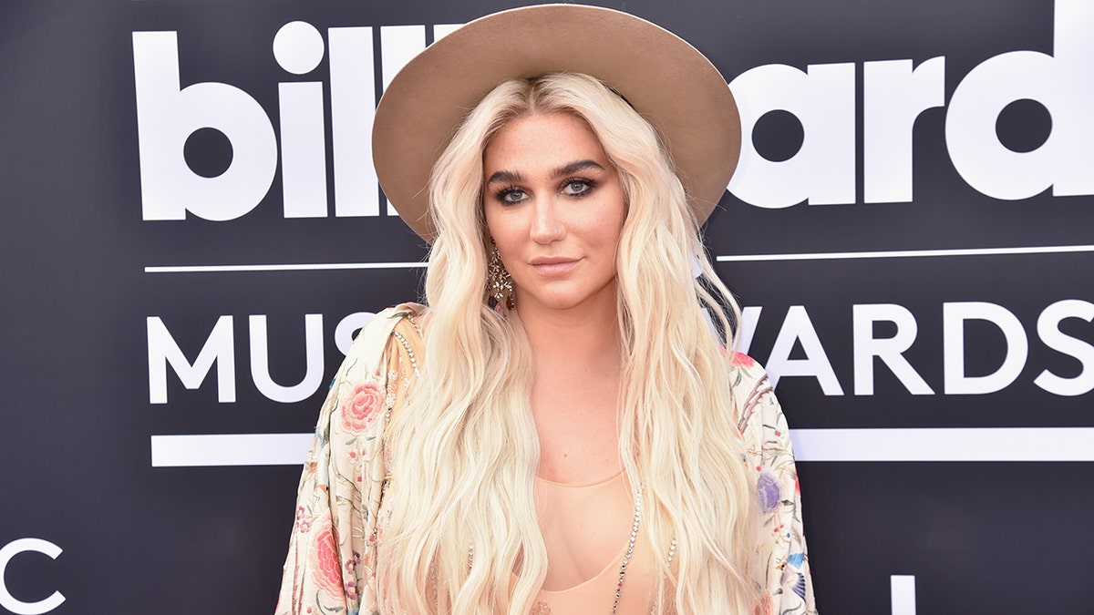 Kesha walks red carpet at Billboard music awards