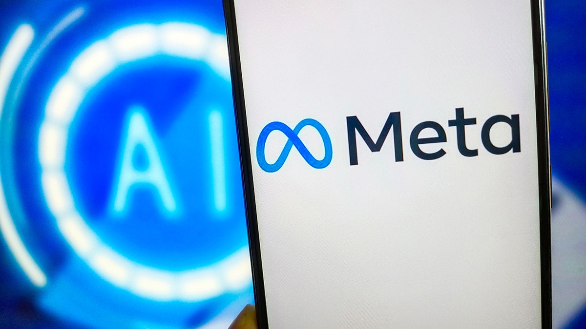 The Meta logo on a phone