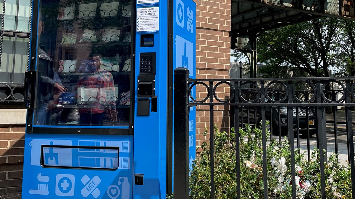 A blue vending machine offering free drug paraphernalia for users to avoid ODs t