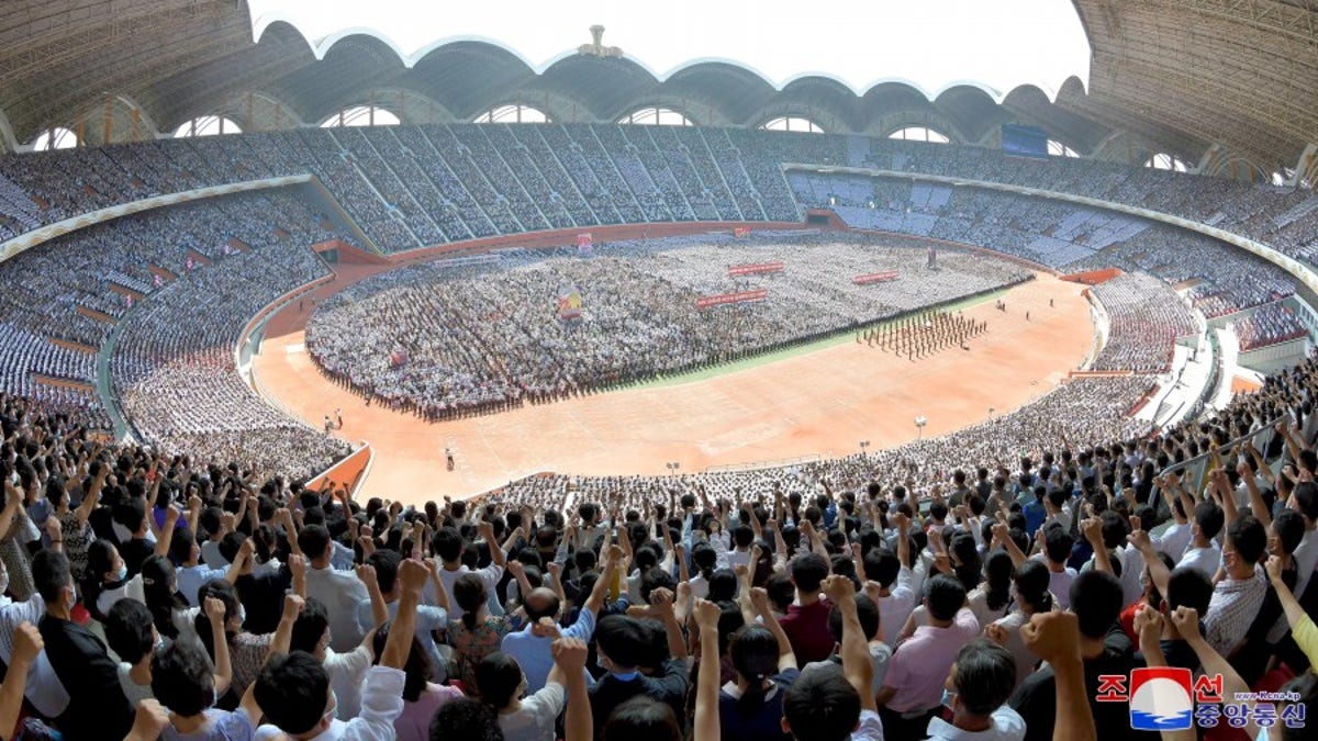 The pictured rally is in Pyongyang