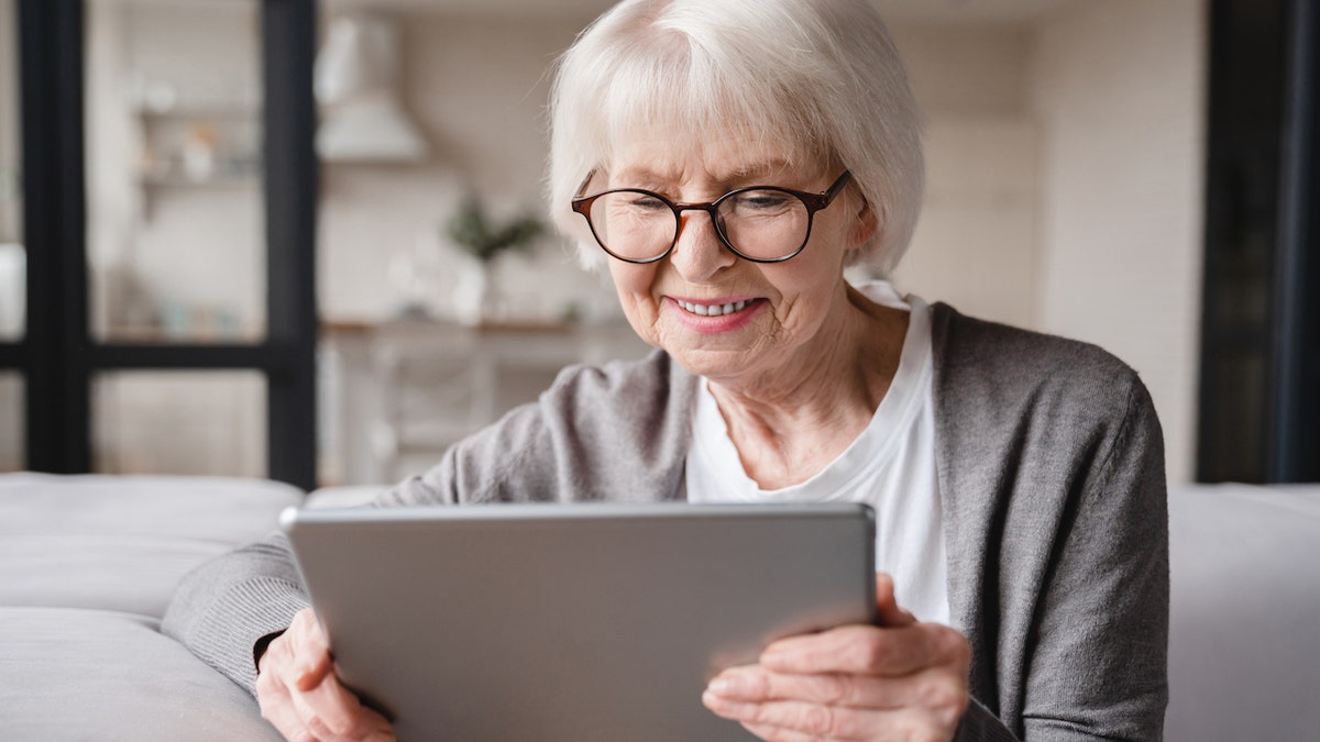 Older woman on tablet