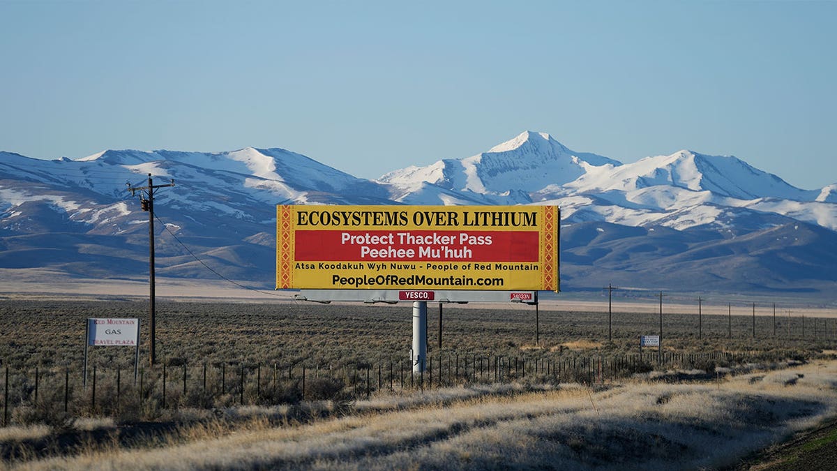 billboard displays "Protect Thacker Pass" 