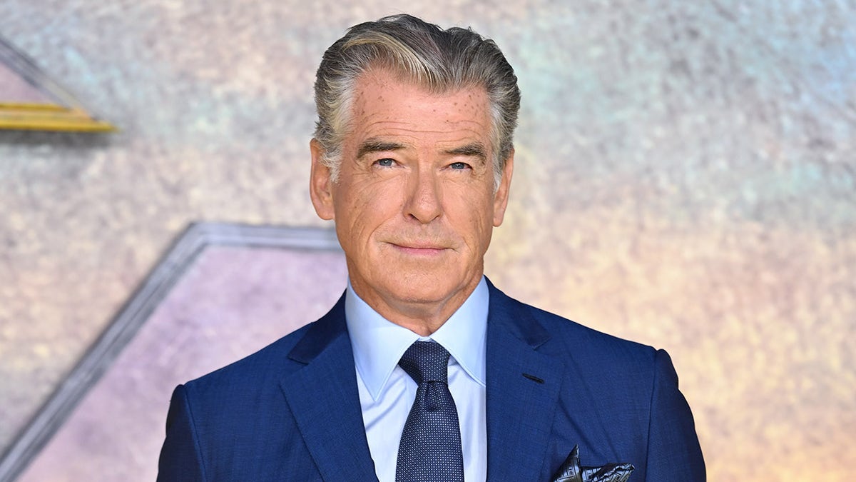 Pierce Brosnan Was Injured Wearing Nothing But a Towel (Exclusive)