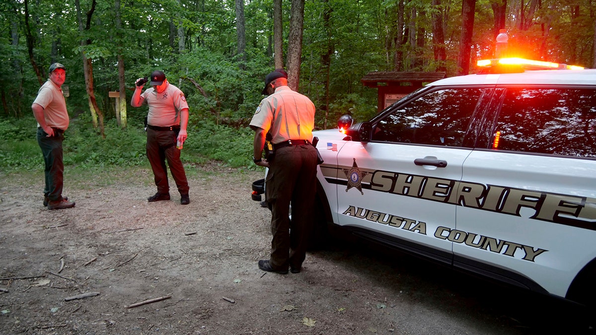 authorities at entrance to trail