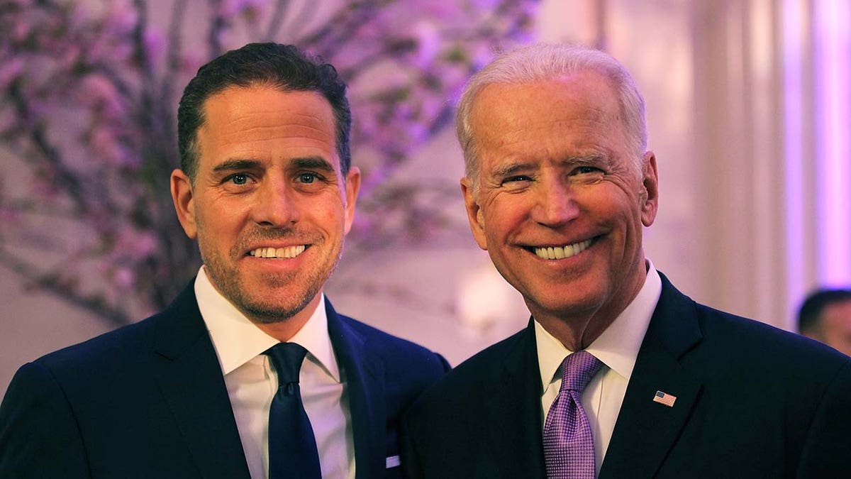 President Biden smiling with Hunter Biden