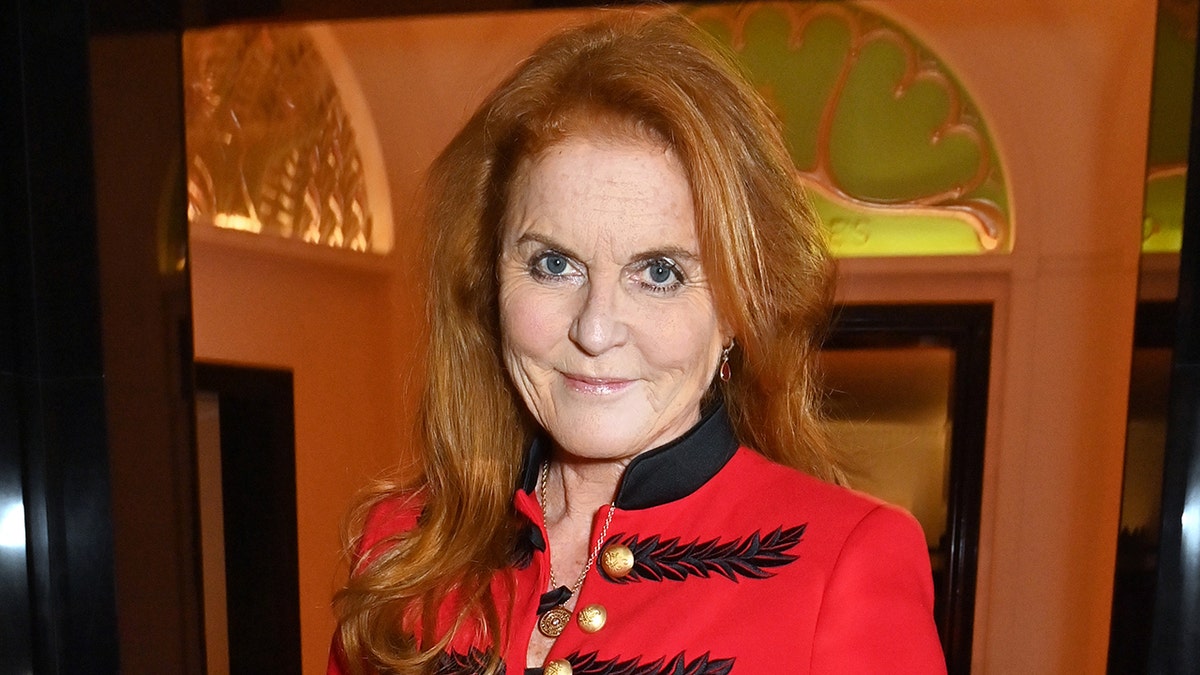 Sarah Ferguson steps out wearing bright red coat to match fiery red hair
