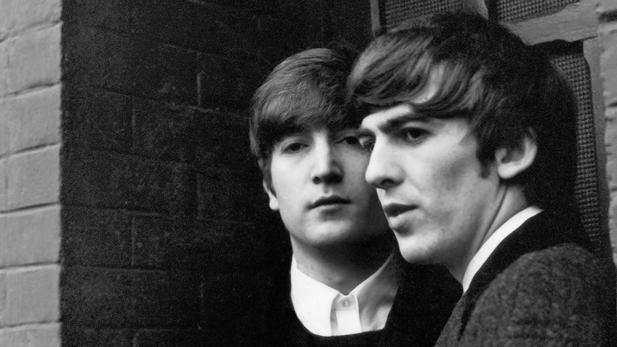 John Lennon and George Harrison. Paris, 1964