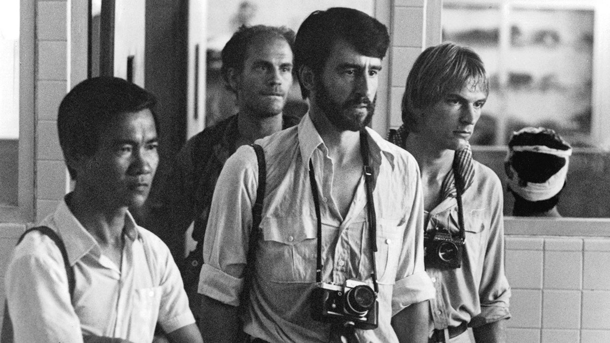 Actors Haing S Ngor, John Malkovich, Sam Waterston and Julian Sands in The Killing Fields 