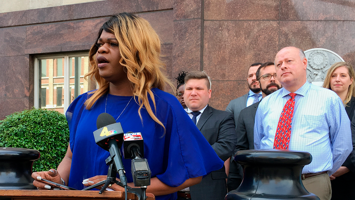 Lead plaintiff talks to crowd outside Tennessee courthouse