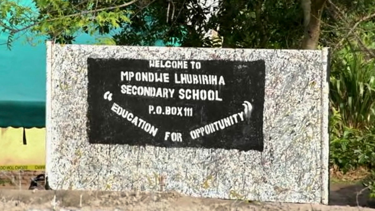 A sign of the Lhubiriha Secondary School in Mpondwe, Uganda