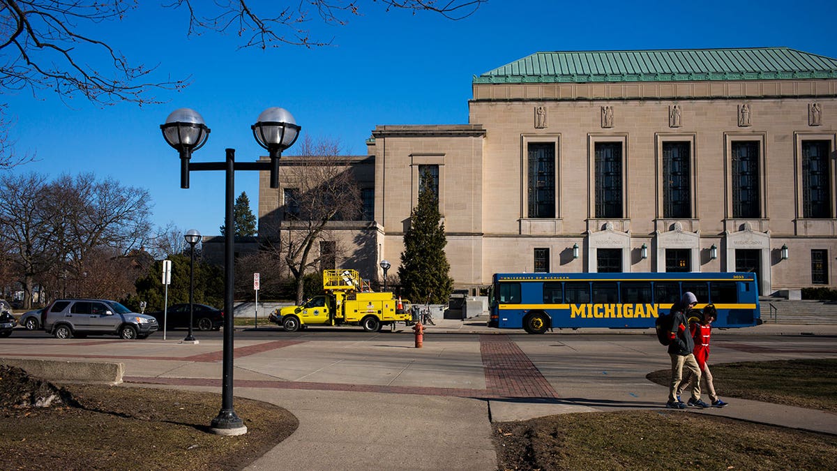 University of Michigan campus with a bus
