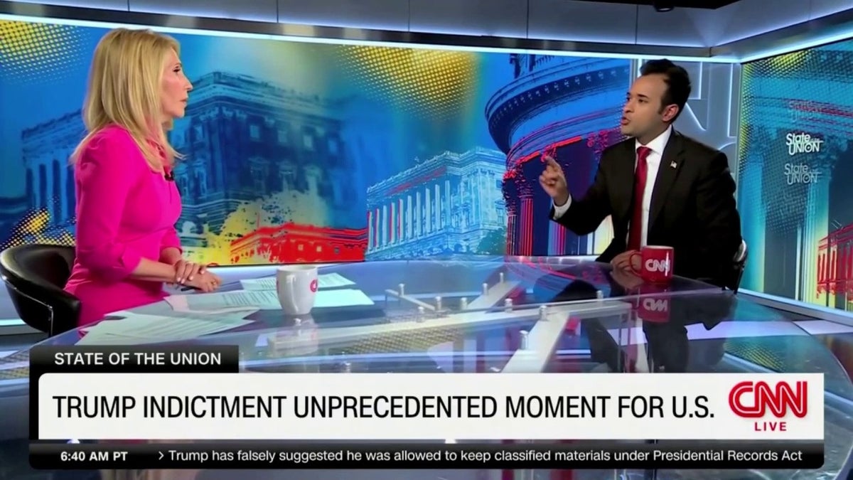 Ramaswamy seated across CNN's Dana Bash