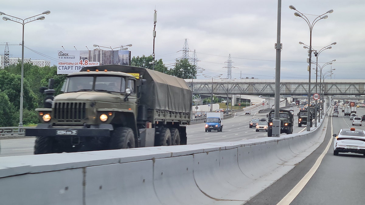 Armored vehicles belonging to the Wagner group travel along the M4 highway towards Moscow
