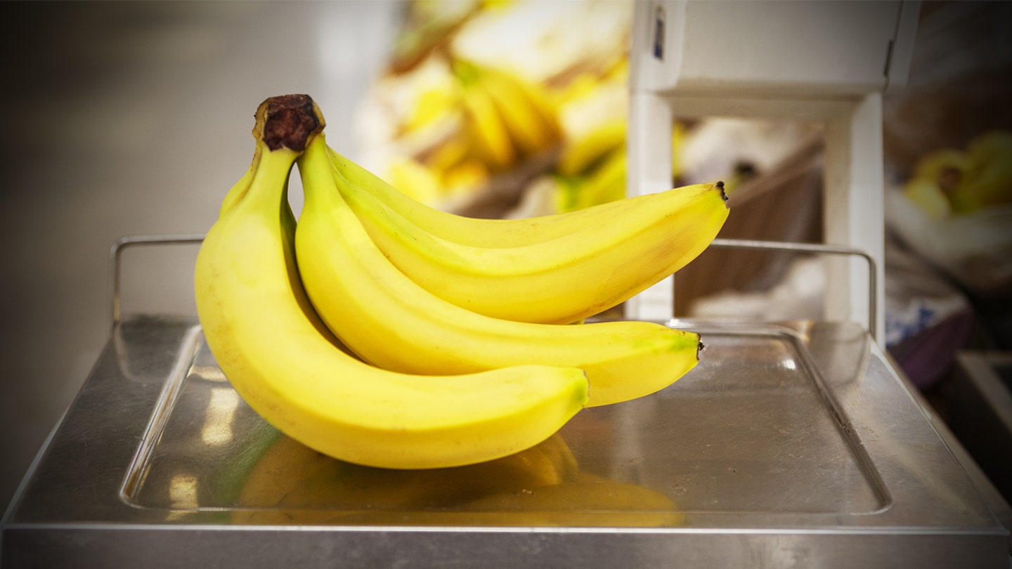 iStock 956431736 bananas weighed on checkout scale