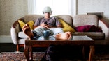 lazy teen boy on couch