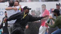 Adam Hadwin's electric celebration and subsequent tackle by security draws hilarious reaction from his wife