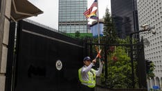 Chinese man arrested in Hong Kong for allegedly spray painting anti-US graffiti at US Consulate