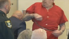 Convicted murderer attacks his attorney in bizarre courtroom clash: 'I used to box'