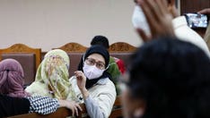 Indonesia police probe drug regulator over cough syrup linked to 200 child deaths