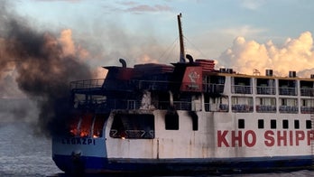 Philippine coast guard rescue 120 people from flaming ferry