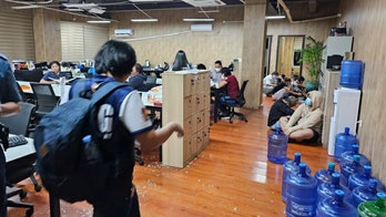 Philippine police rescue over 2,700 workers in alleged cybercrime building raid