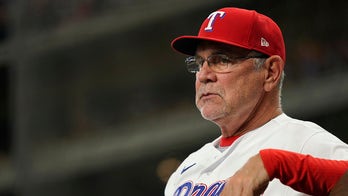 Umpire ejects 3 Rangers members during bizarre altercation following questionable strikeout
