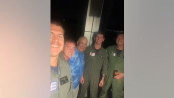 South Carolina Coast Guard helicopter crew rescues man aboard grounded boat