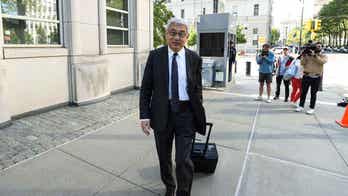 American sleuth, 2 Chinese men charged with helping China harass, intimidate dissidents into returning home