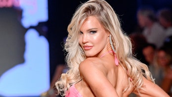 Former Playboy model Joy Corrigan heats up the runway modeling bikinis during Miami’s Paraiso Swim Week