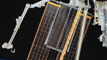 NASA astronauts bring more power to International Space Station by installing new roll-out solar array