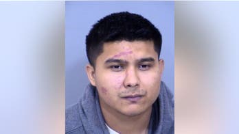 Arizona man accused of secretly filming another man in mall bathroom stall