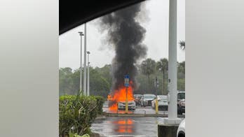 Florida woman was shoplifting when her car with 2 children inside burst into flames, police say