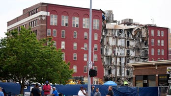 Crews in Iowa demolish remains of collapsed apartment building